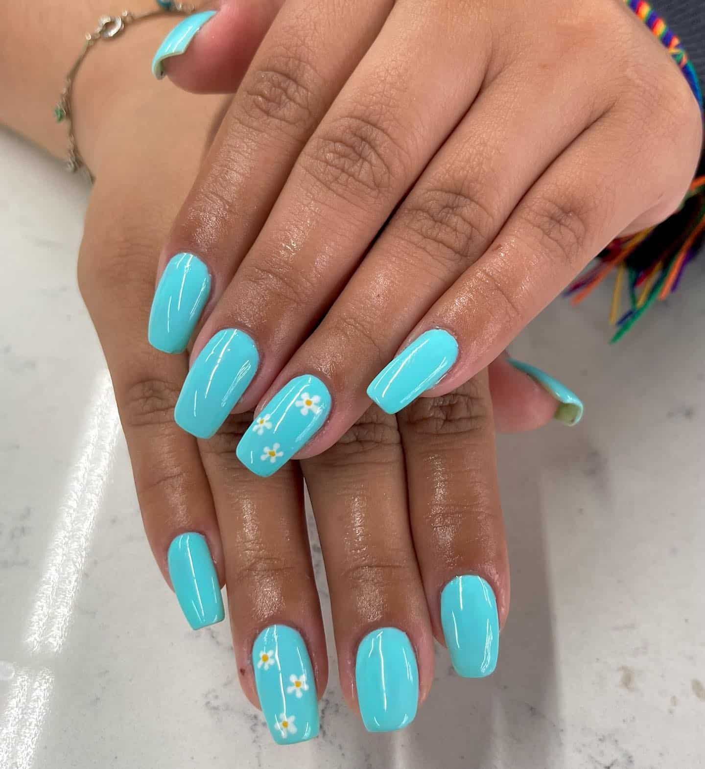 10. Tiffany Blue with Mini Daisy Details - tiffany blue nail ideas