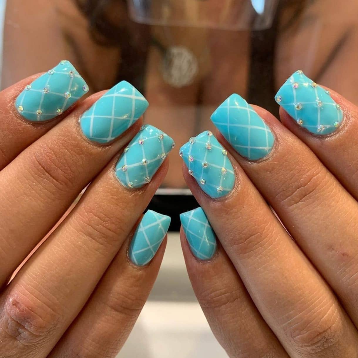 11. Quilted Tiffany Blue with Crystal Accents - tiffany blue nail ideas