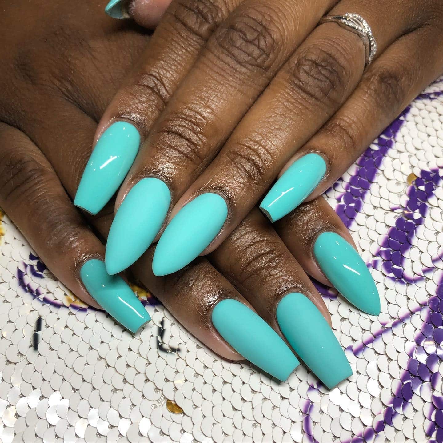 19. Sharp Tiffany Blue Almond Nails - tiffany blue nail ideas