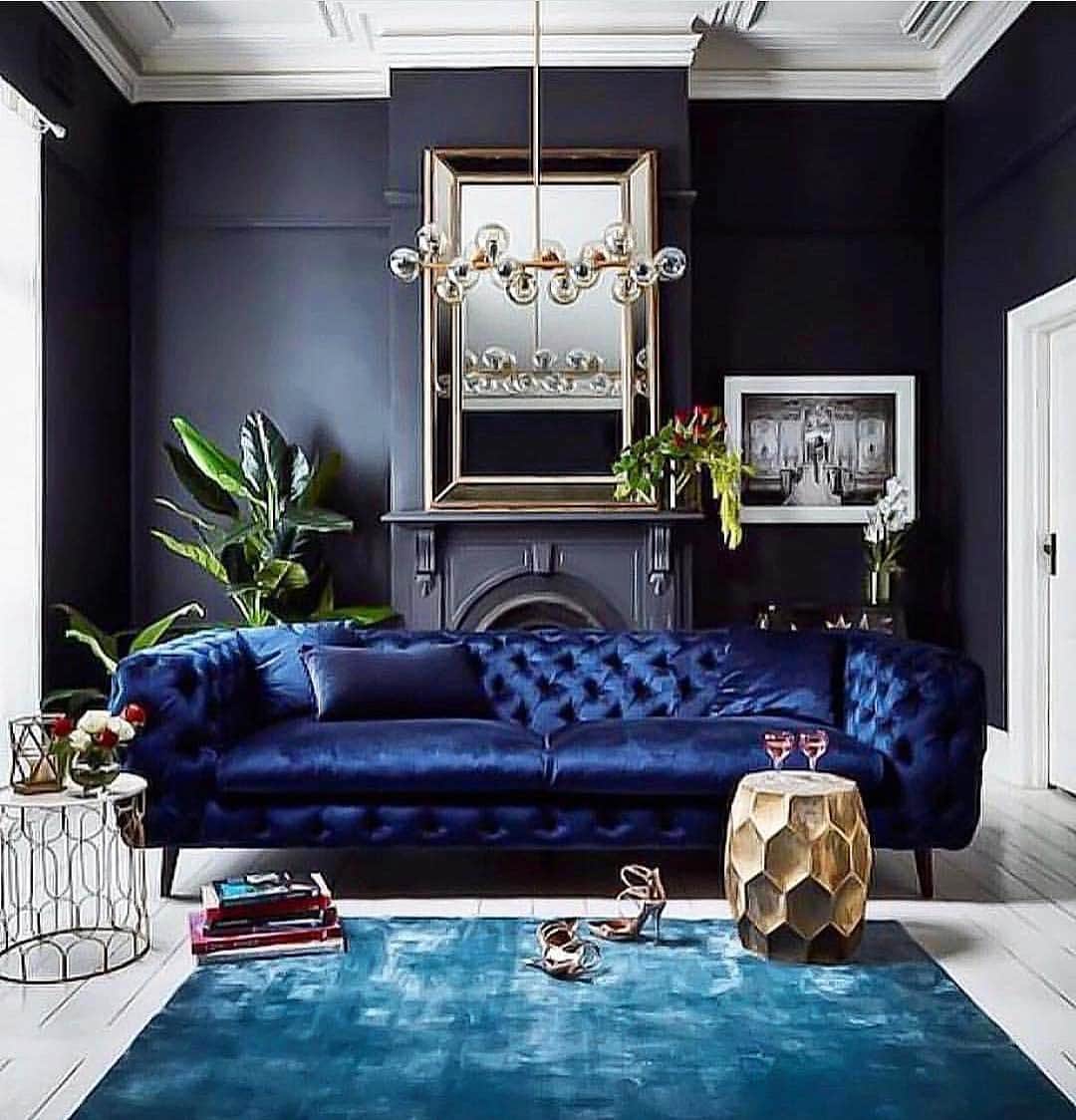 13. Bold Statement with Blue and Black Walls - black and blue living room ideas