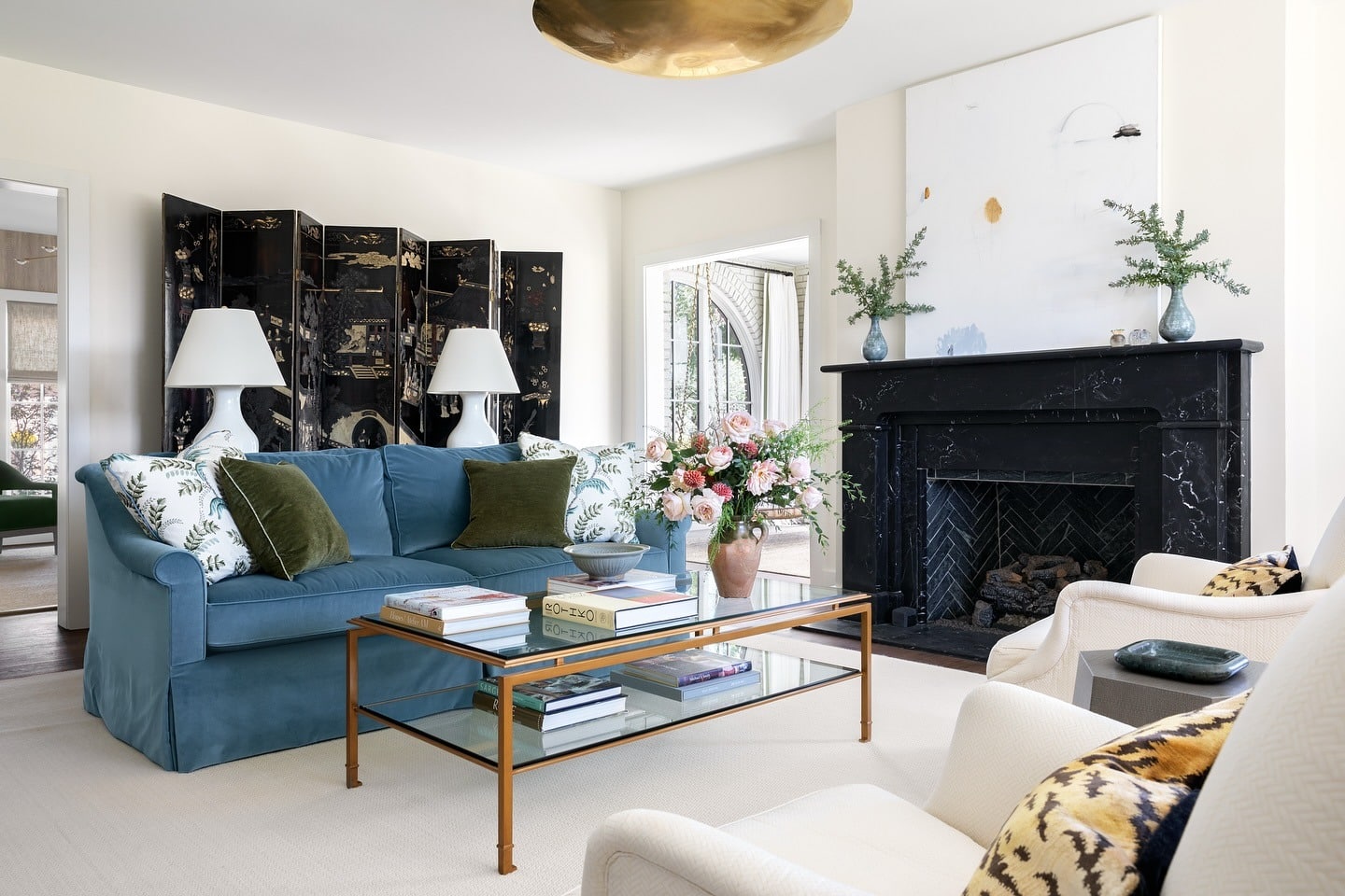 18. Fresh Transitional with Soft Blue Sofa - black and blue living room ideas