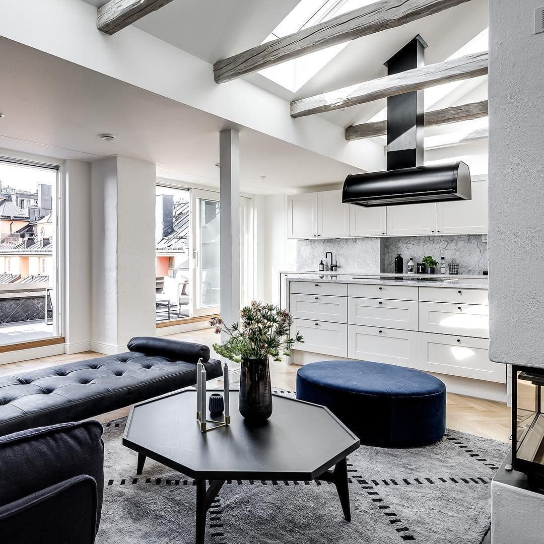 21. Scandinavian Elegance with Black and Blue Accents - black and blue living room ideas