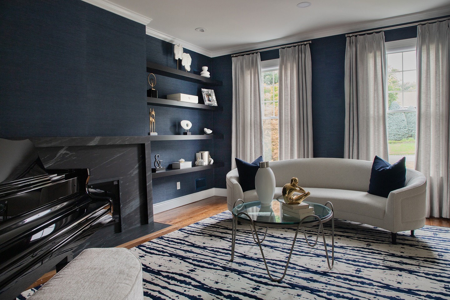 22. Sophisticated Contrast with Navy Walls - black and blue living room ideas