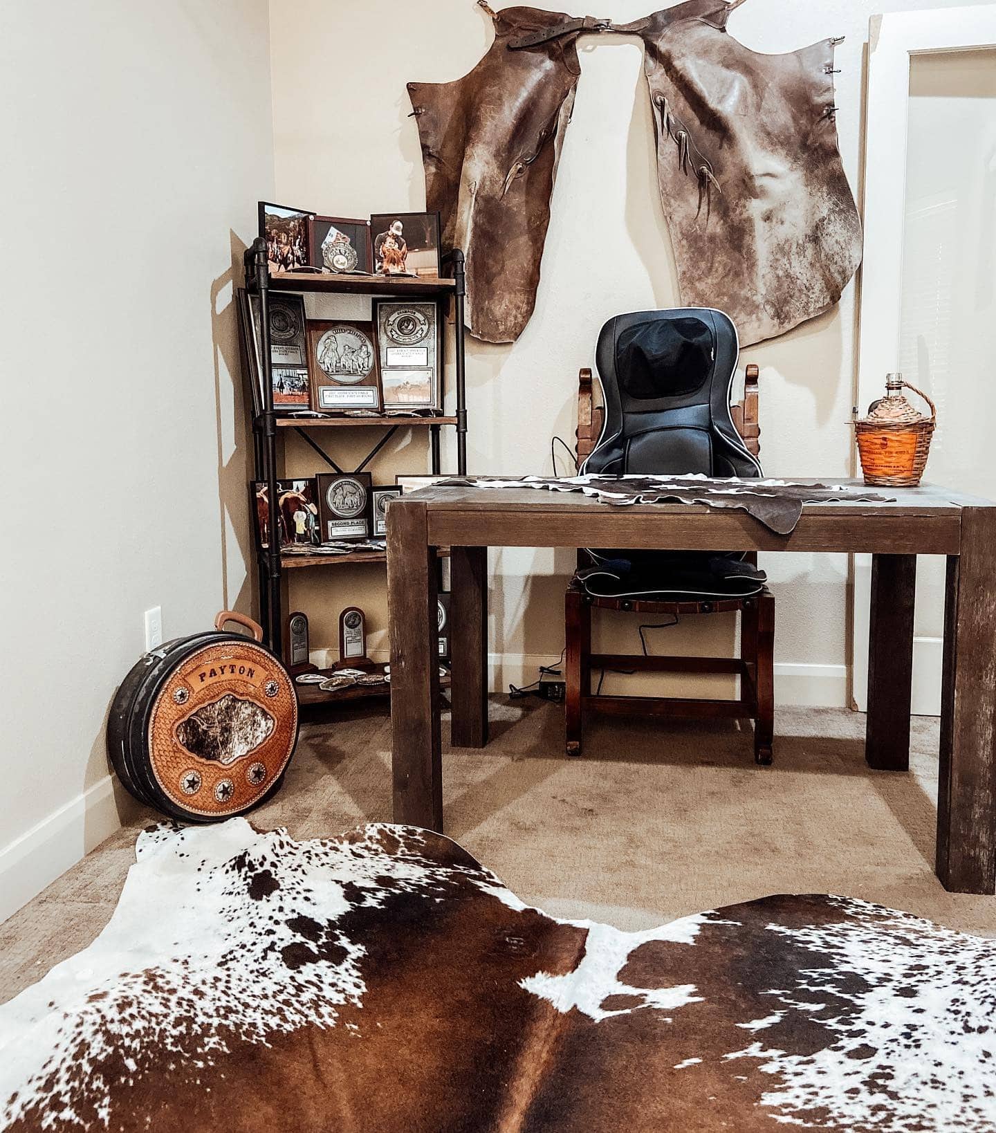 7. Cowhide Rustic with Western Heritage Touches - rustic office ideas
