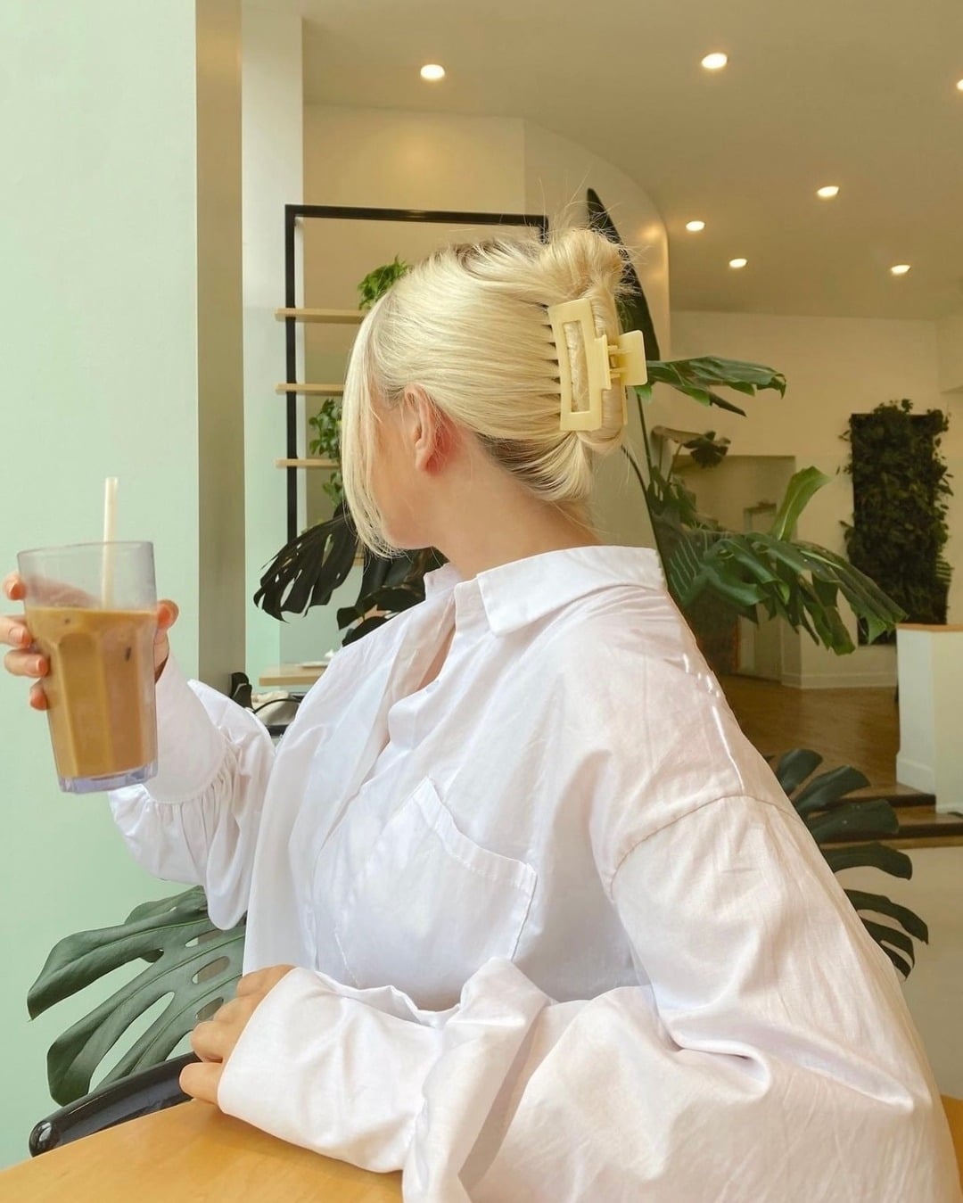 3. Blonde French Twist with Oversized Beige Clip - Claw Clip Hairstyles