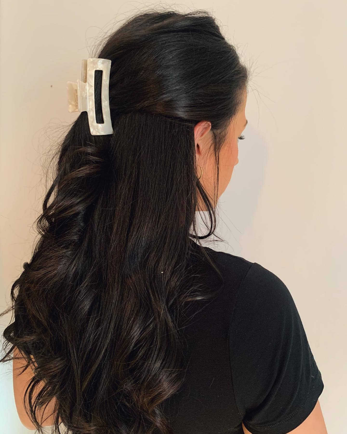 8. Glossy Waves with Pearlized Claw Clip on Jet Black Hair - Claw Clip Hairstyles
