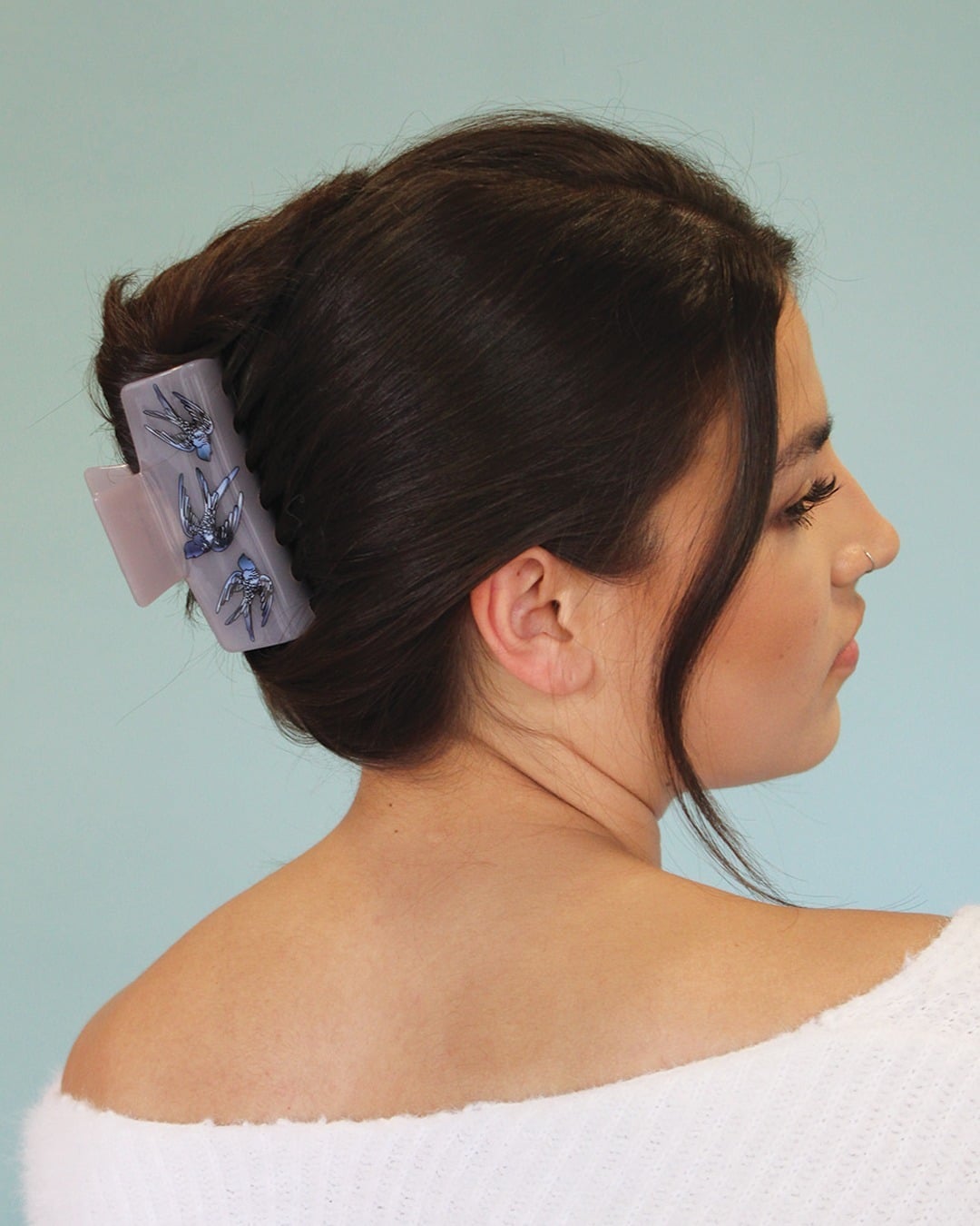 9. Structured Twist with Embellished Lavender Clip on Deep Brown Hair - Claw Clip Hairstyles
