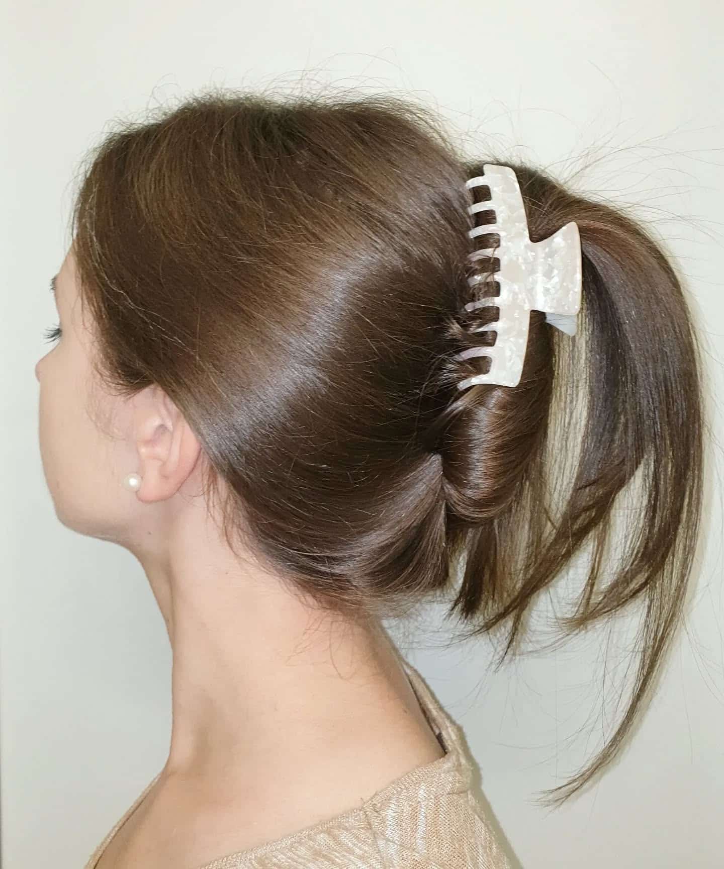 15. French Roll with Pearlized Clip on Chestnut Brown Hair - Claw Clip Hairstyles