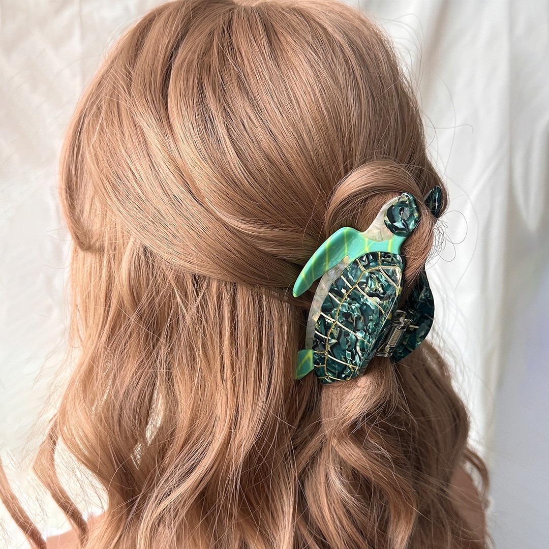 19. Wavy Half-Up with Turtle Clip on Strawberry Blonde Hair - Claw Clip Hairstyles