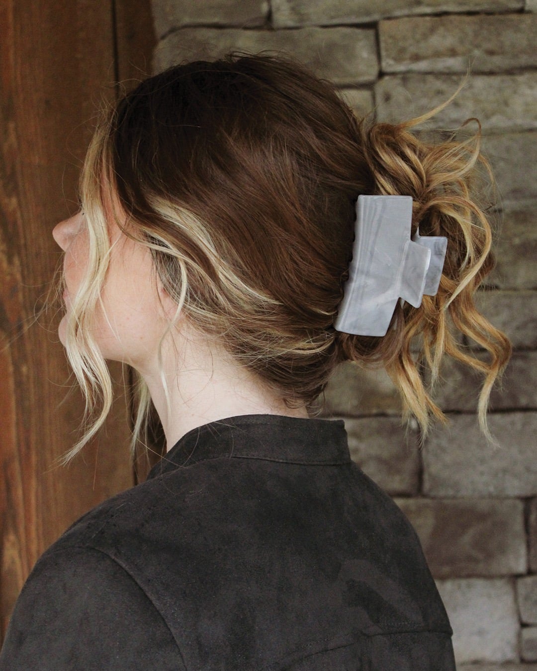 21. Textured Low Twist with Gray Clip on Balayage Brunette Hair - Claw Clip Hairstyles