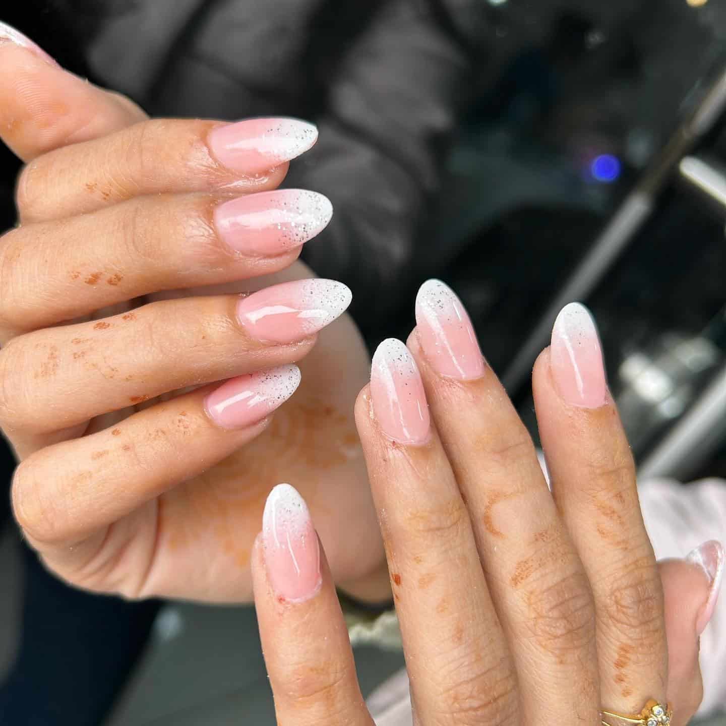 2. Almond Gradient with Fine Glitter Tips - white ombre nail ideas