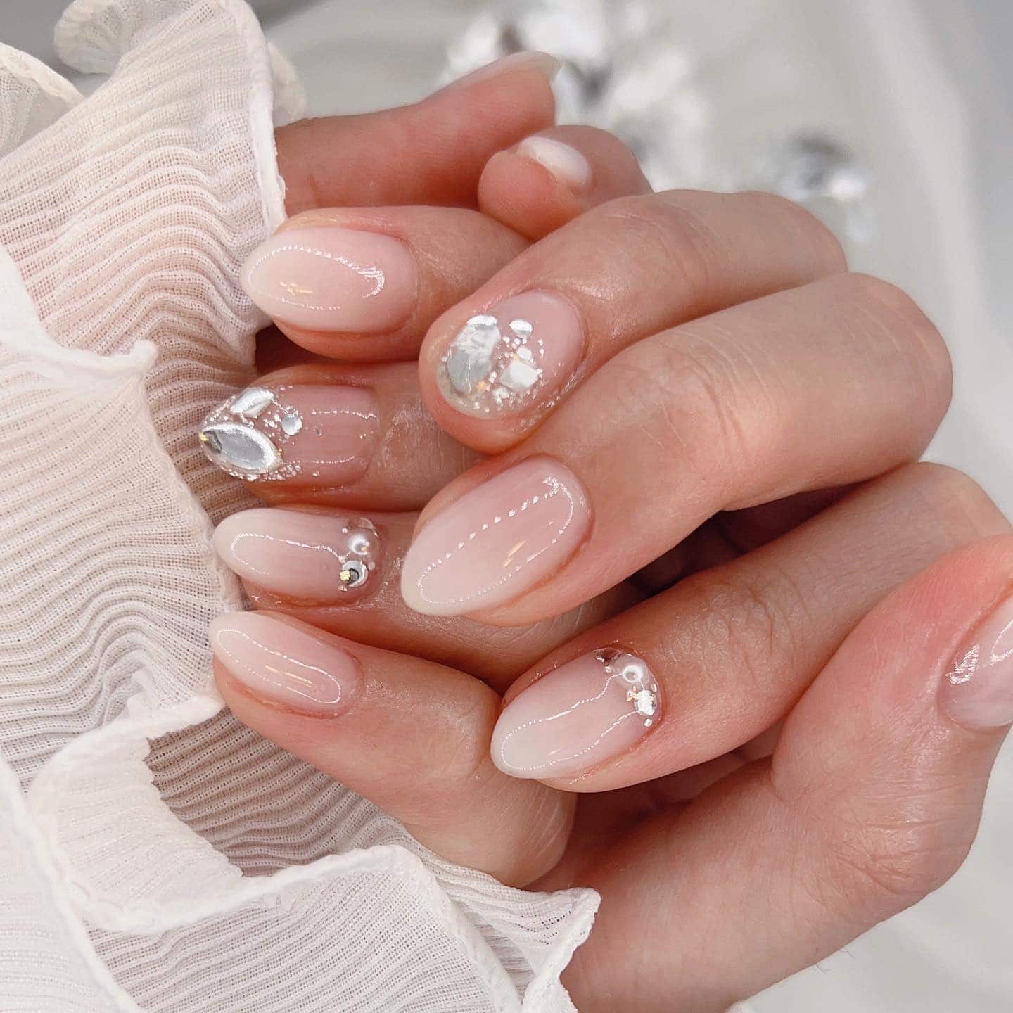 4. Embellished White Ombre Elegance - white ombre nail ideas