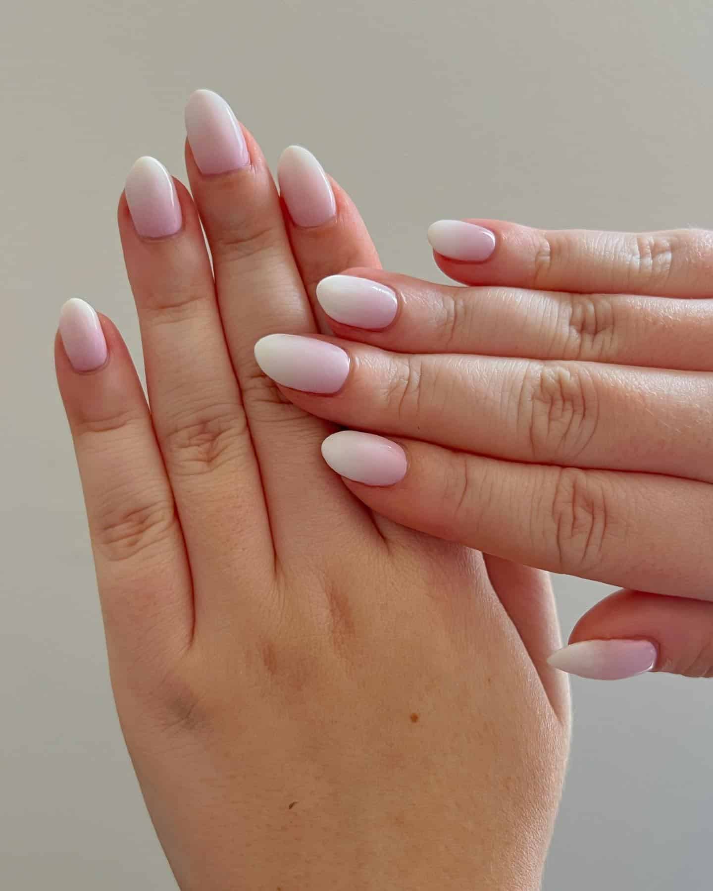 5. Soft Blush-to-White Ombre Almonds - white ombre nail ideas