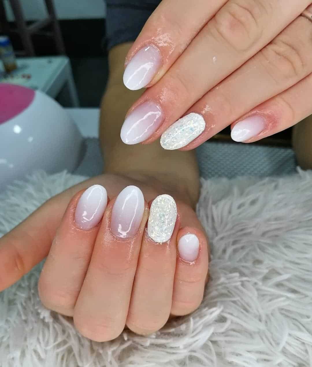 7. White Ombre with Accent Glitter Nail - white ombre nail ideas