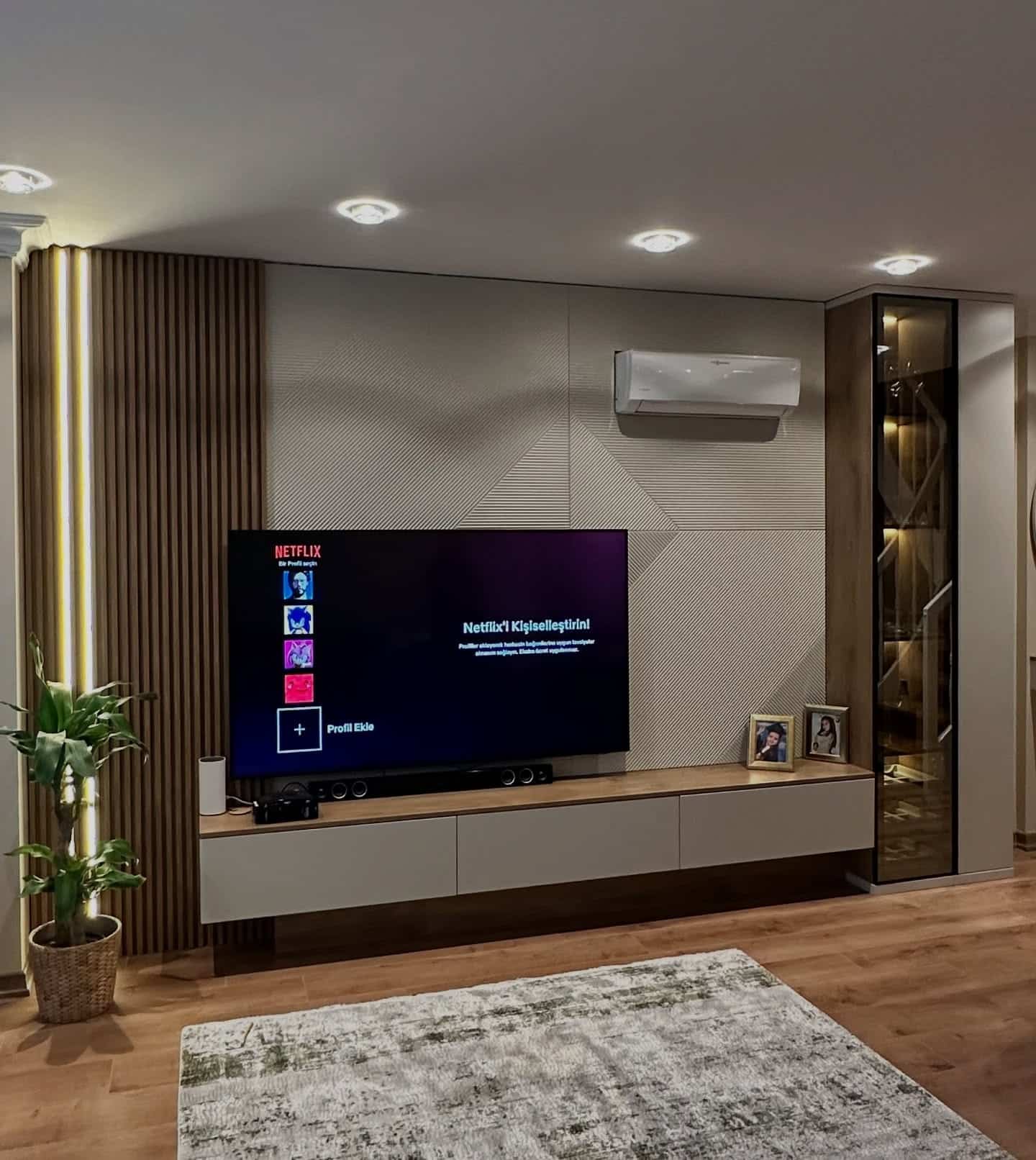 3. Minimalist Comfort with Geometric Texture - living room tv ideas