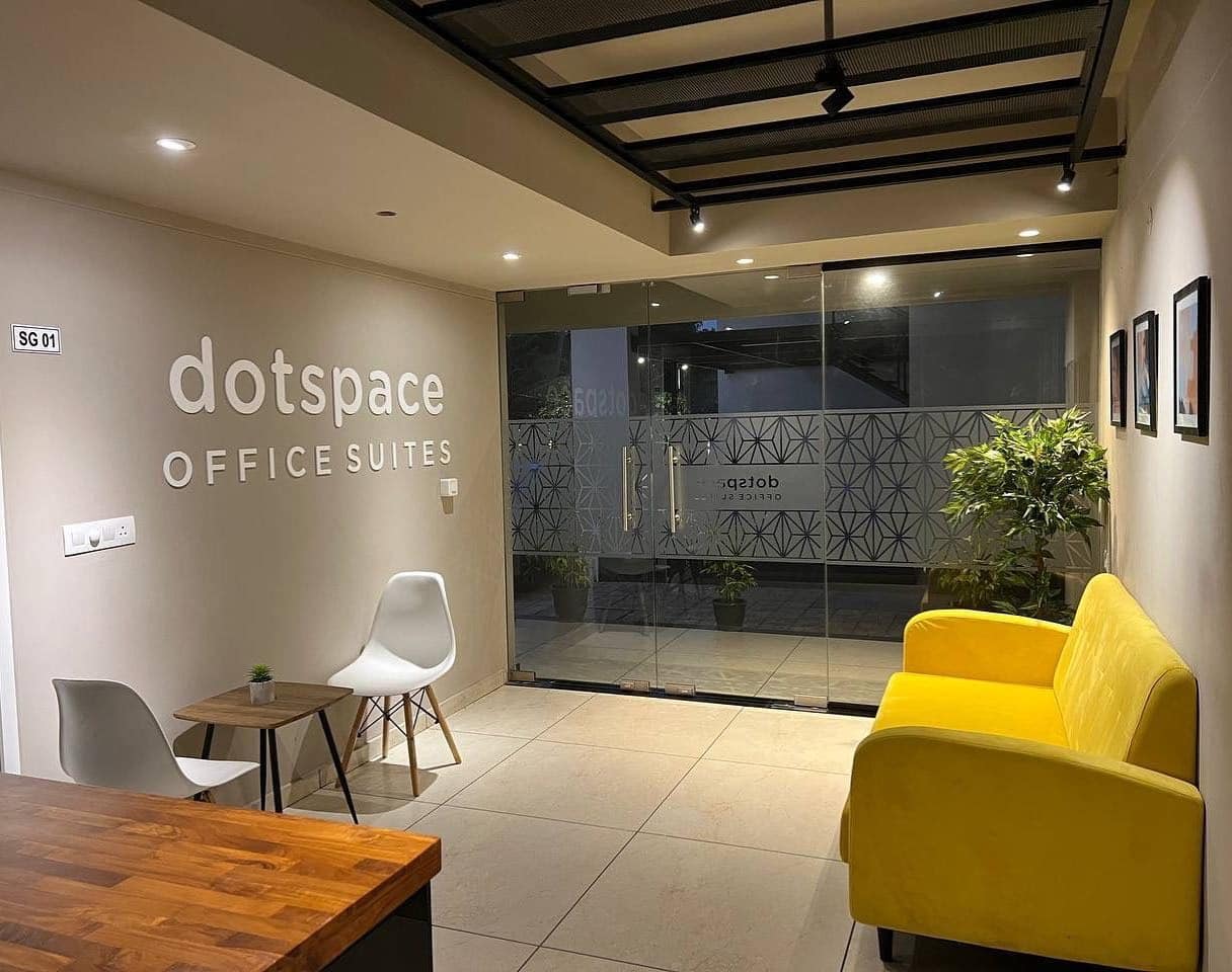 4. Modern Simplicity with a Pop of Sunshine - lounge office room ideas