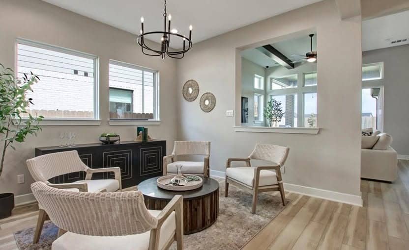 16. Transitional Elegance with Light Wood - lounge office room ideas