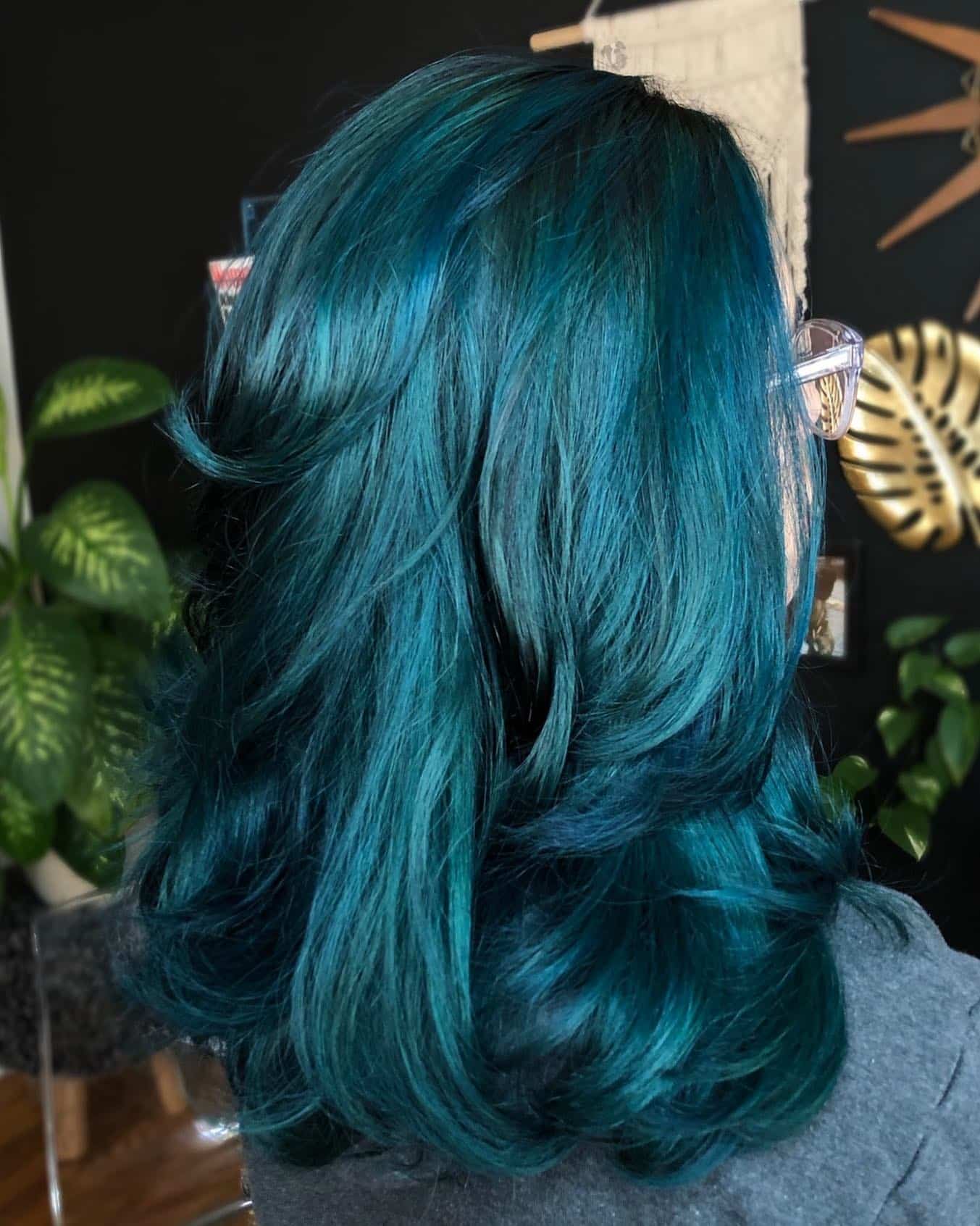 7. Voluminous Teal Layers - Teal Hair Color