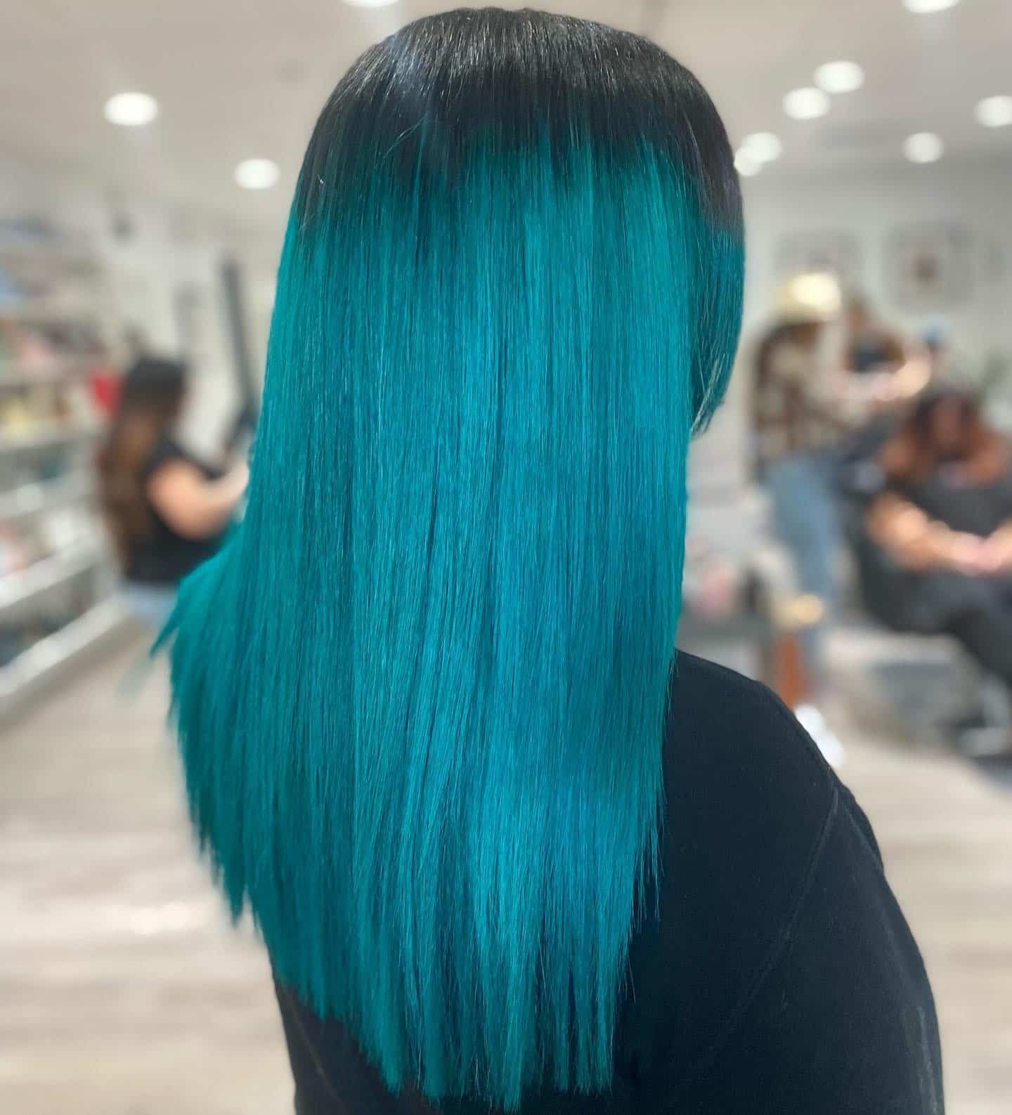22. Sleek Teal Ombre - Teal Hair Color