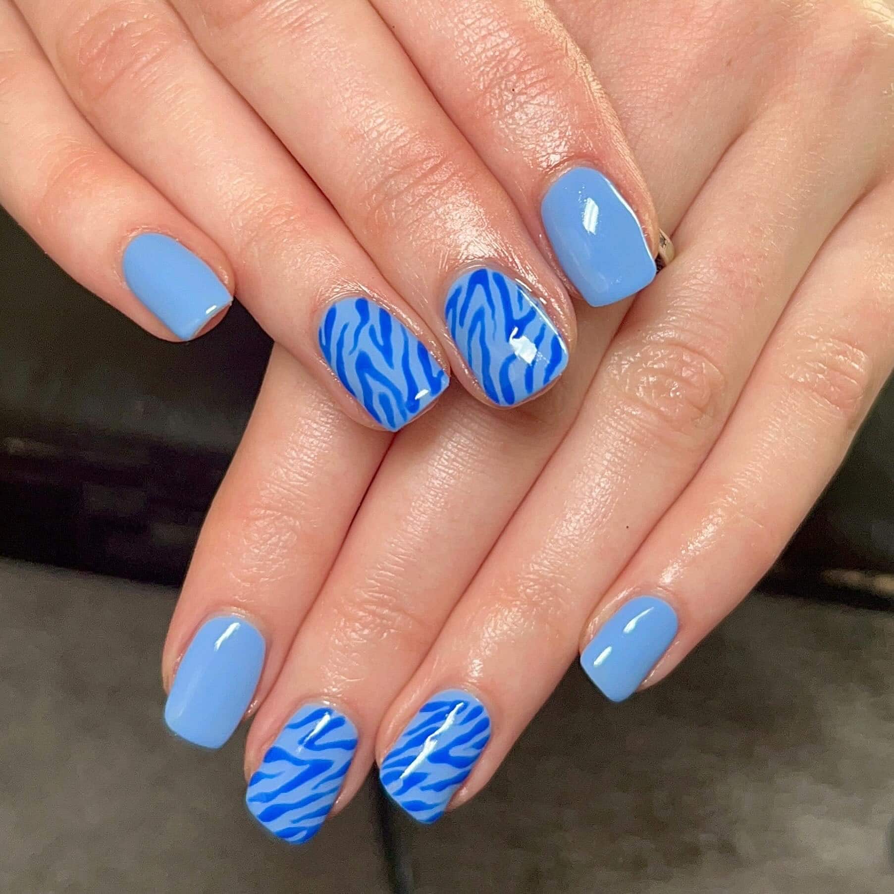 4. Vibrant Blue Zebra Short Nails - zebra nail ideas