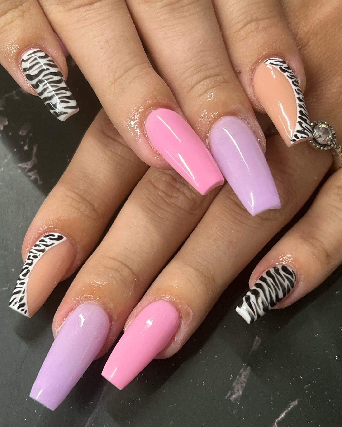19. Pastel Mix with Zebra Accent - zebra nail ideas