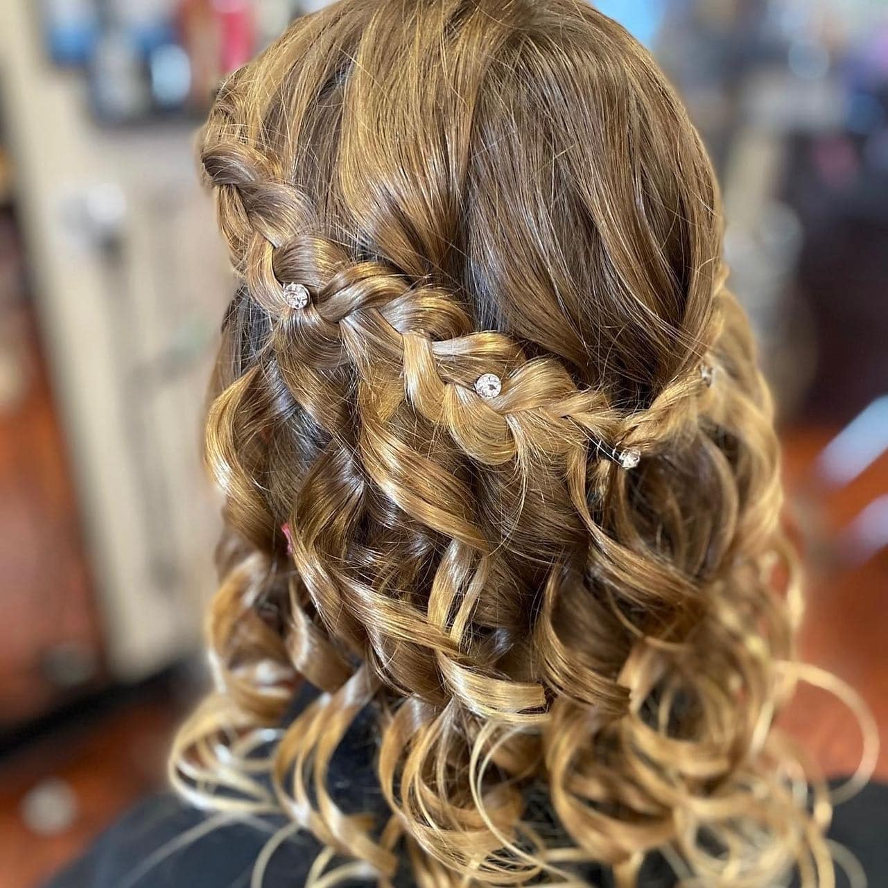 10. Crystal-Embellished Braided Half-Up on Caramel Curls - Formal Hairstyles