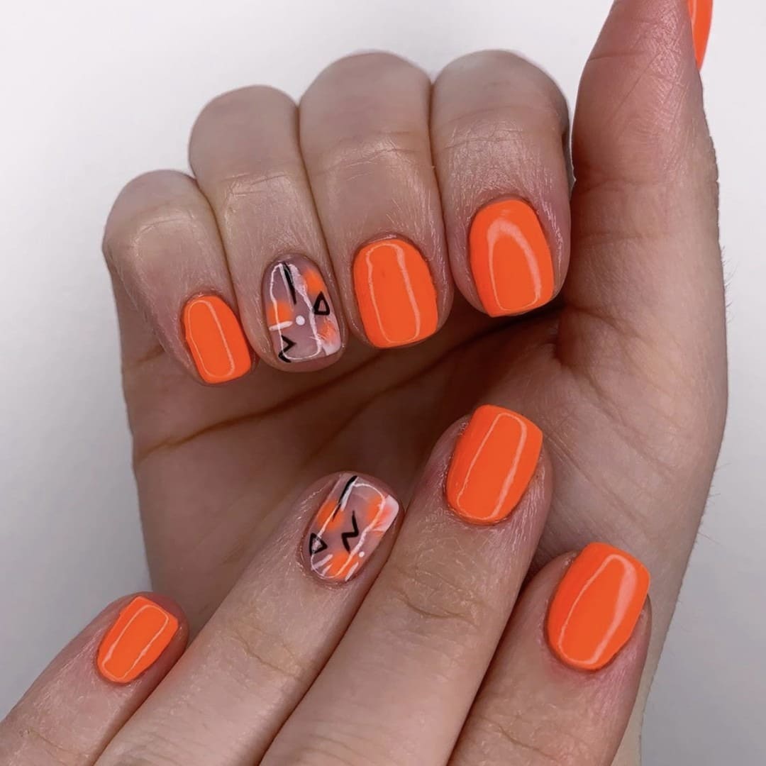 10. Neon Orange with Abstract Accent - accent nail ideas