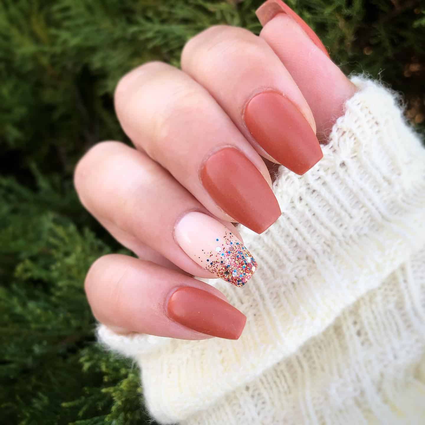 19. Terracotta Matte with Glitter Accent - accent nail ideas