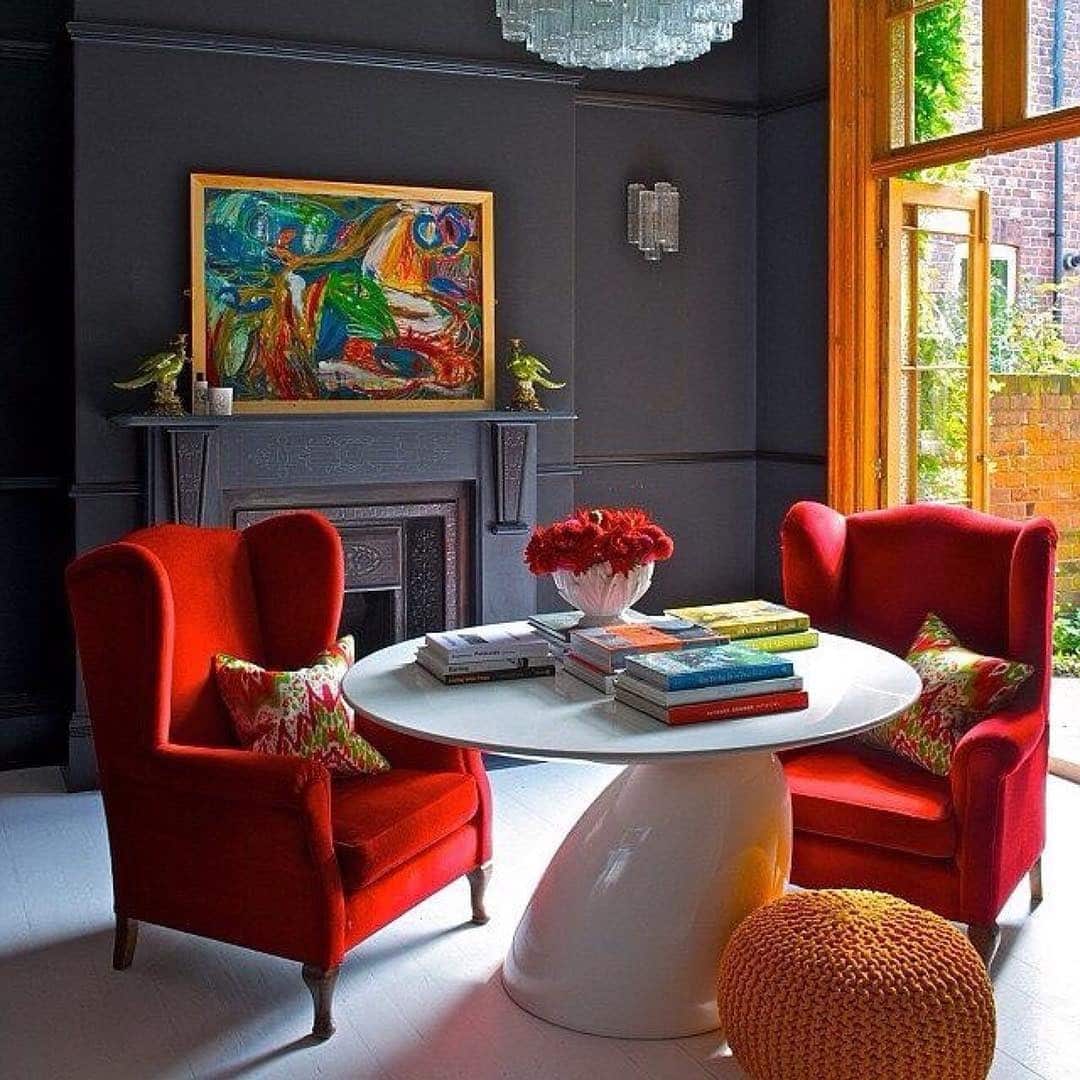 1. Bold Contrast with Artistic Flair - red and black living room ideas