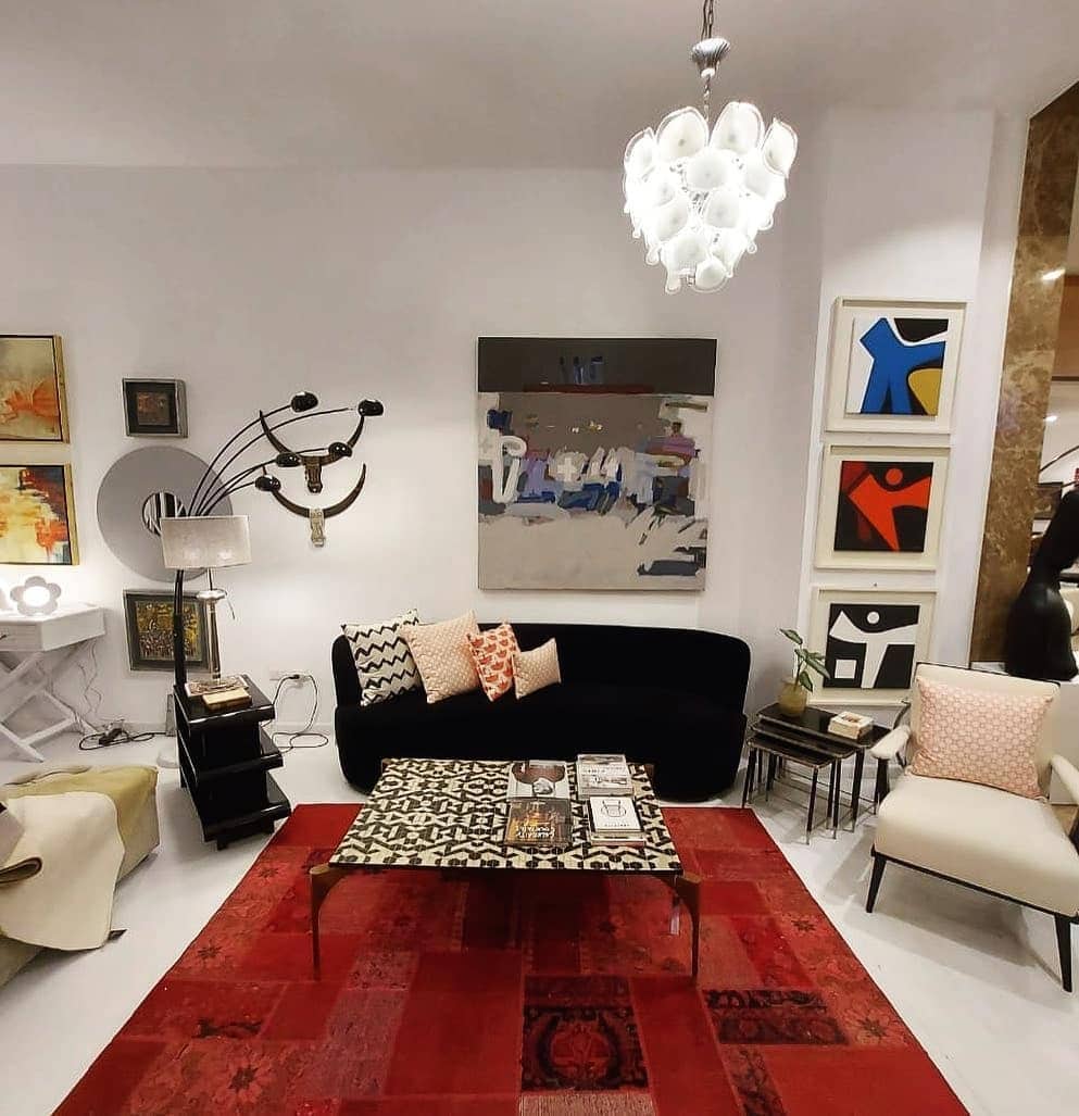 5. Artistic Eclecticism - red and black living room ideas