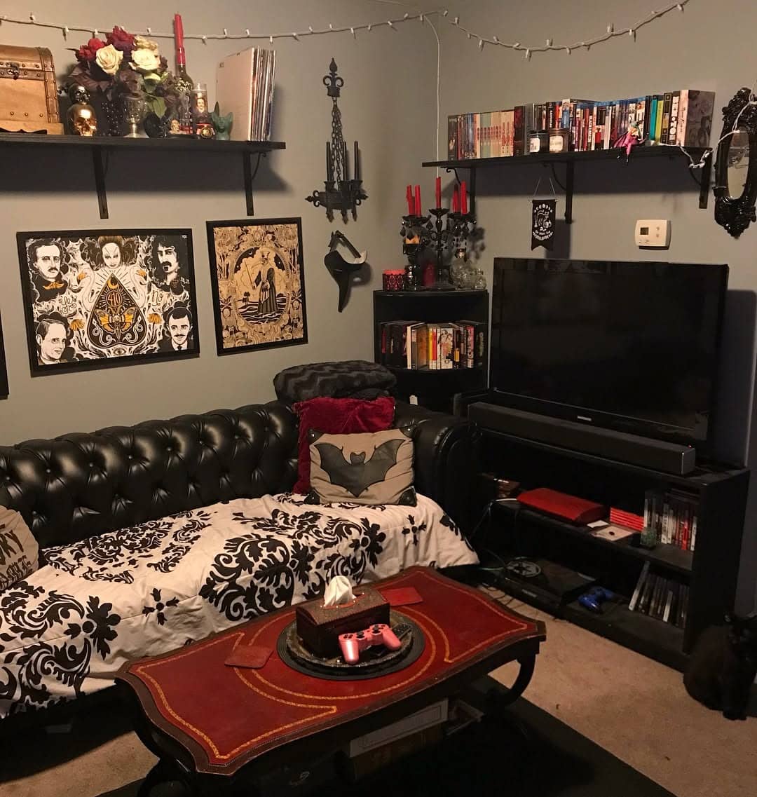 11. Bold Contrast with Artistic Flair - red and black living room ideas