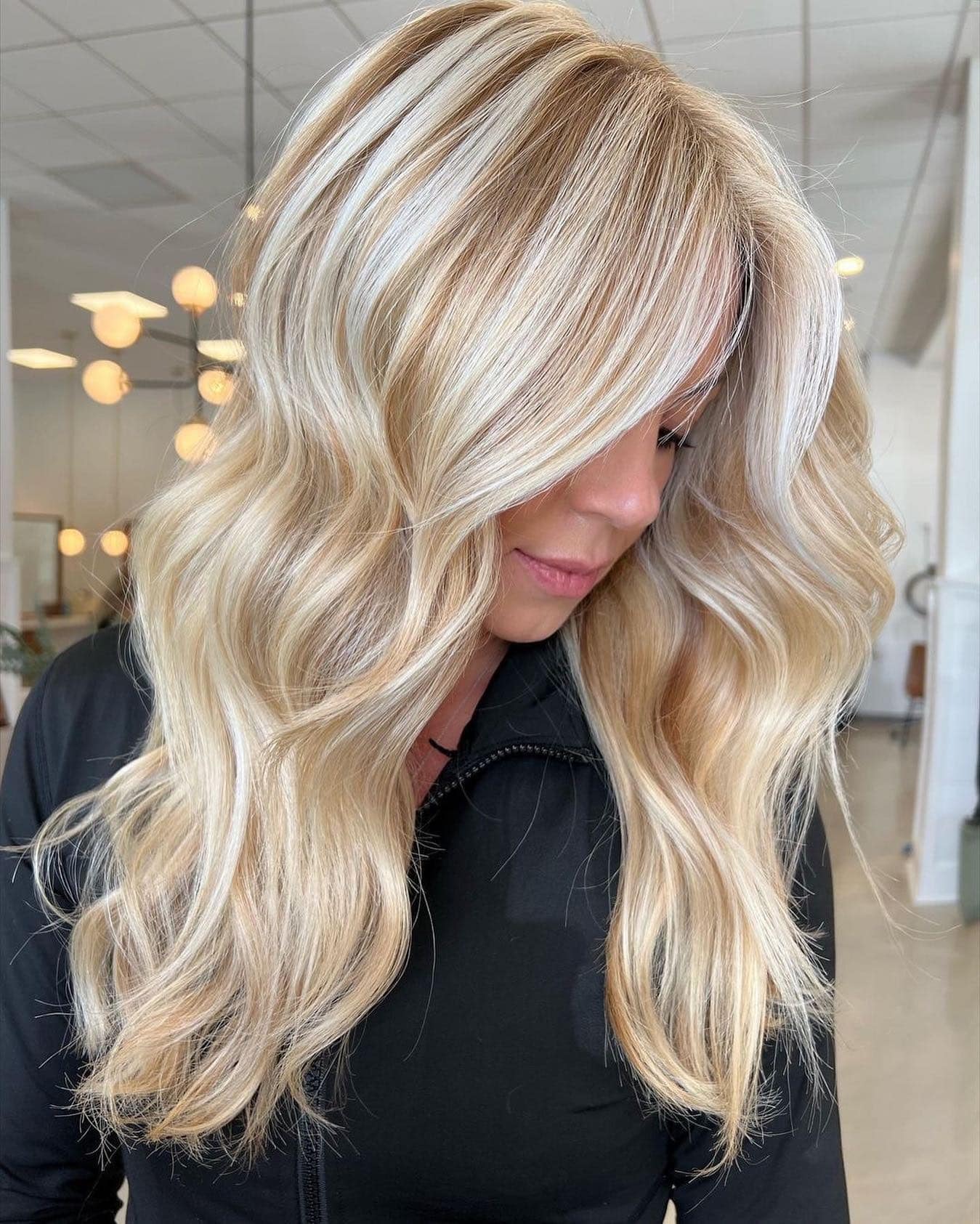 1. Radiant Vanilla Blonde Waves - Winter Hair Color