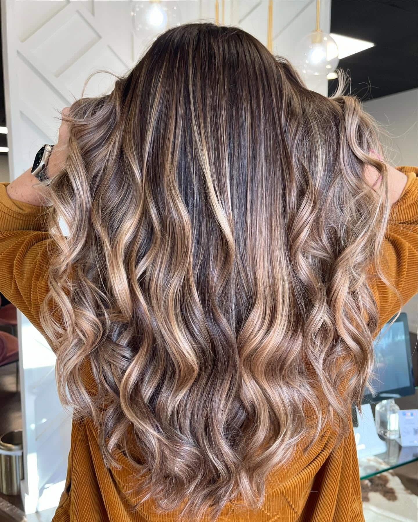14. Smoky Bronde Curls - Winter Hair Color