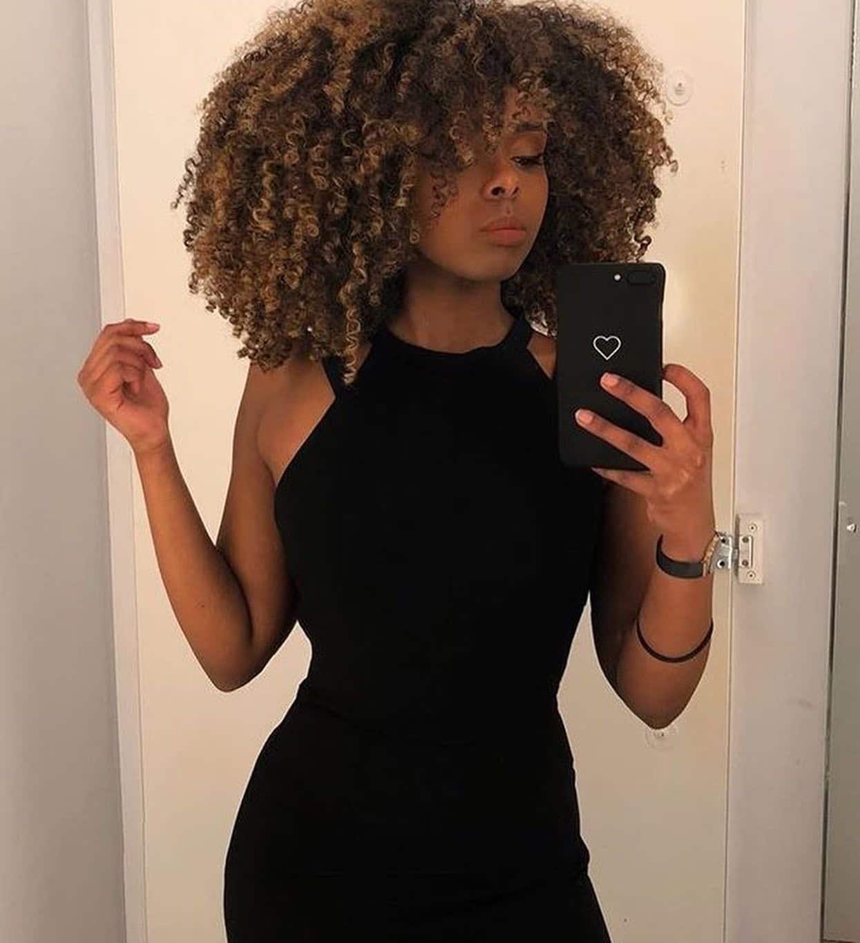 5. Shoulder-Length Natural Curls – Honey Blonde Highlights - Baddie Hairstyles