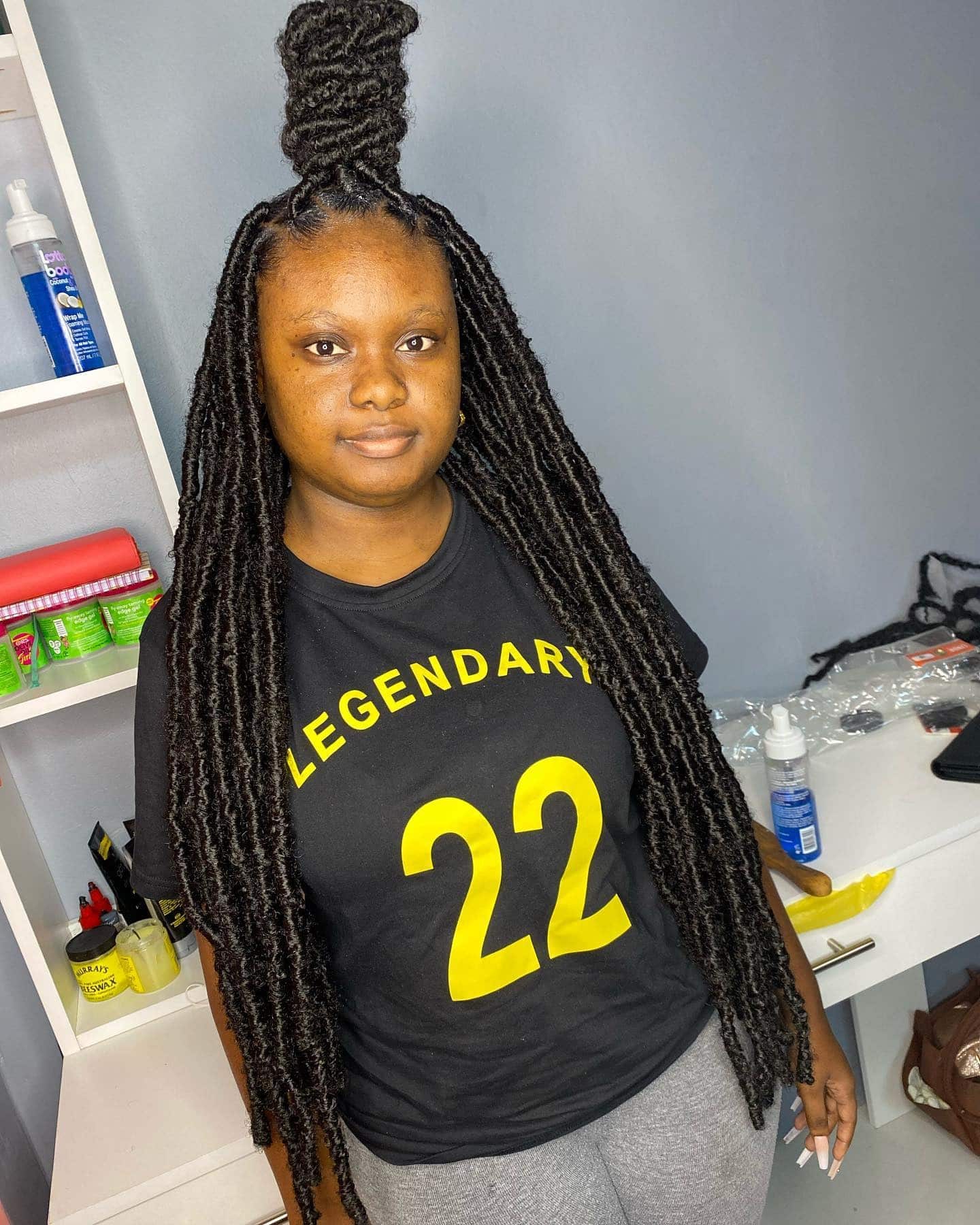 8. Goddess Locs with Top Knot – Jet Black - Baddie Hairstyles