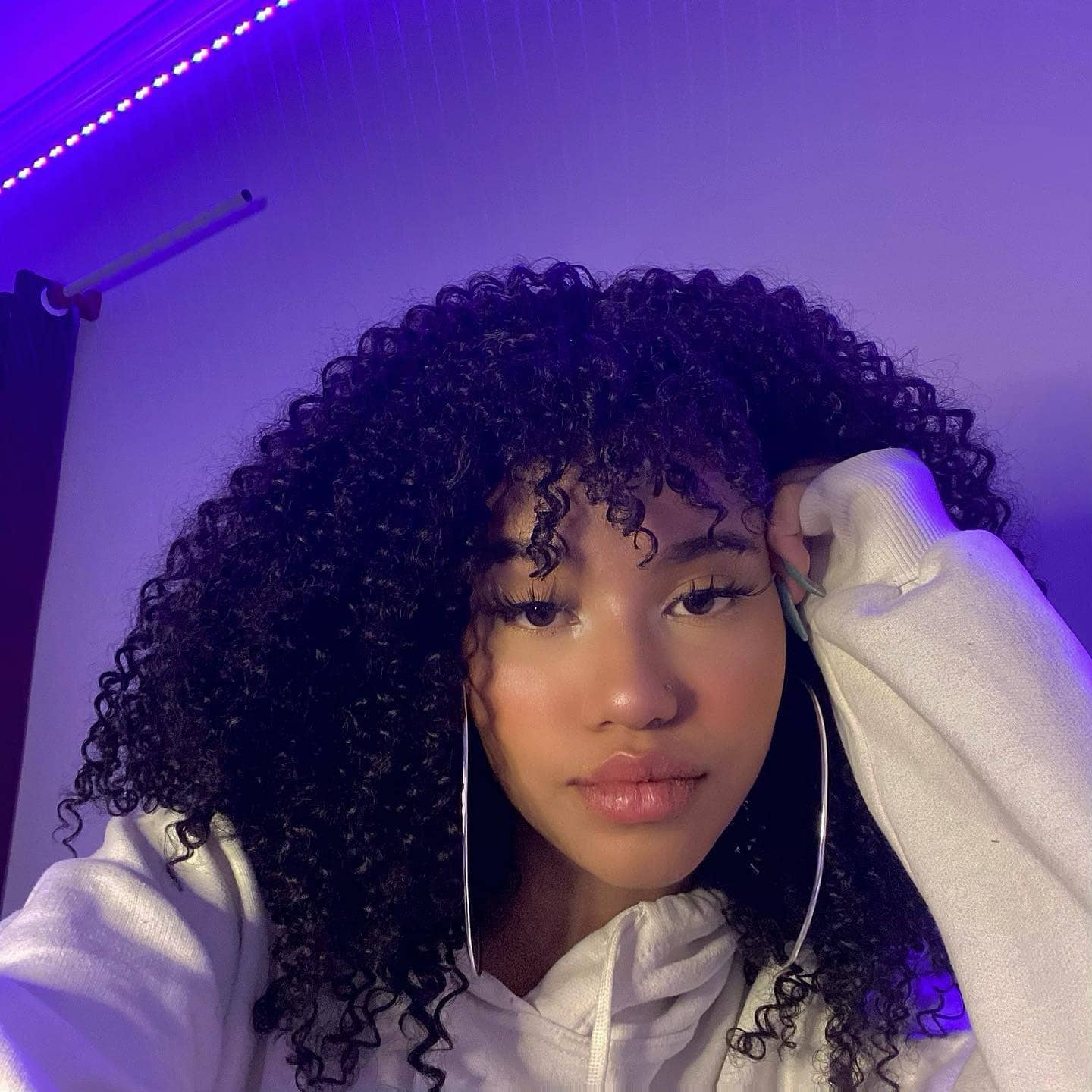 10. Natural Curly Fro with Bangs – Deep Black - Baddie Hairstyles