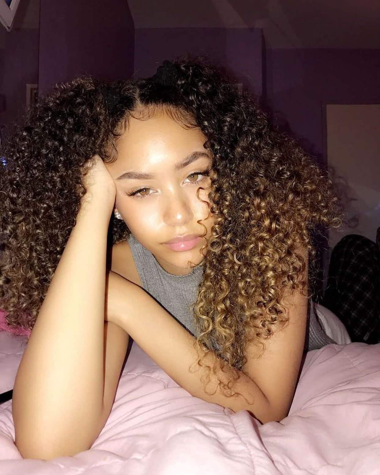 11. Voluminous Curls with Caramel Ombre - Baddie Hairstyles