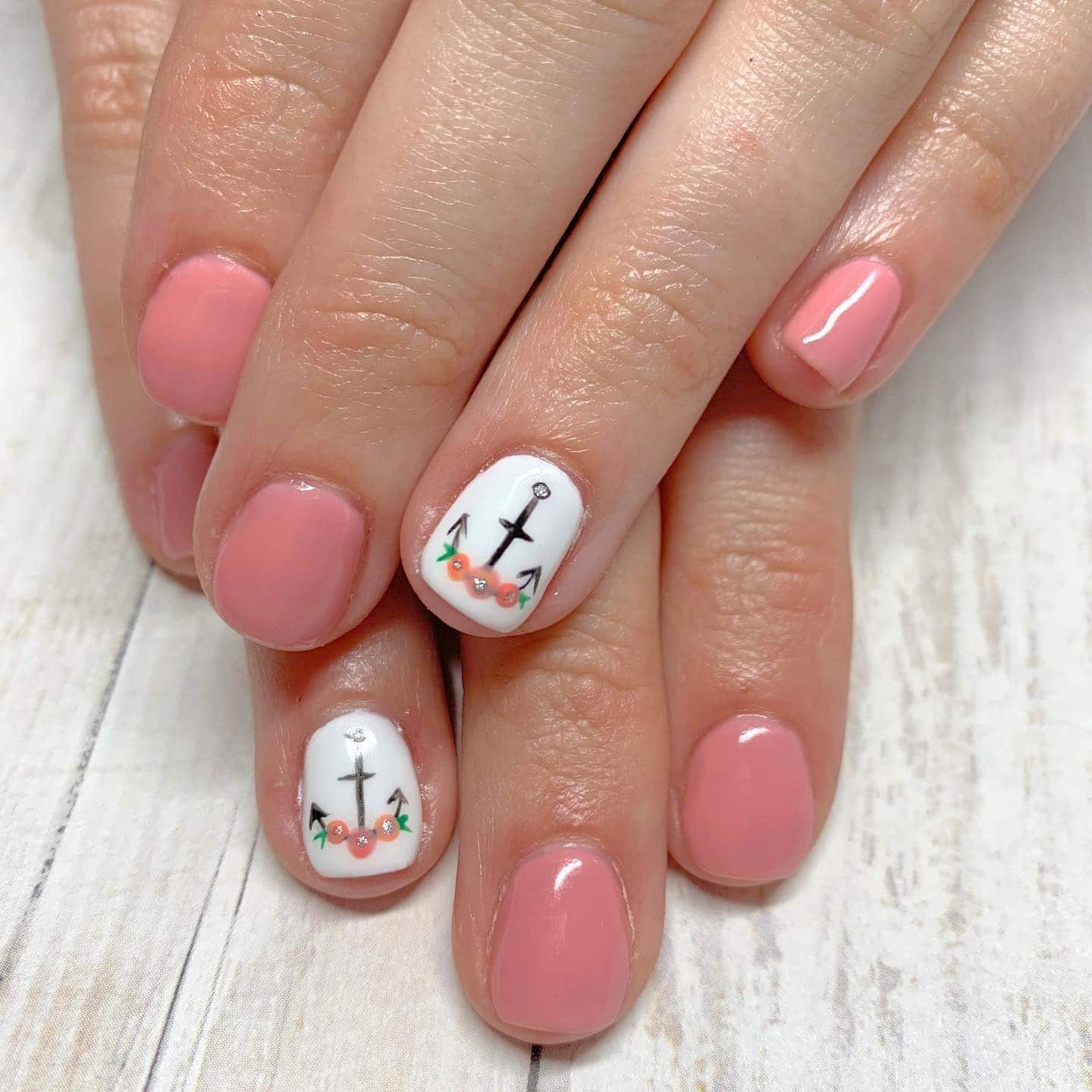 1. Soft Coral Anchors with Floral Accent - anchor nail ideas