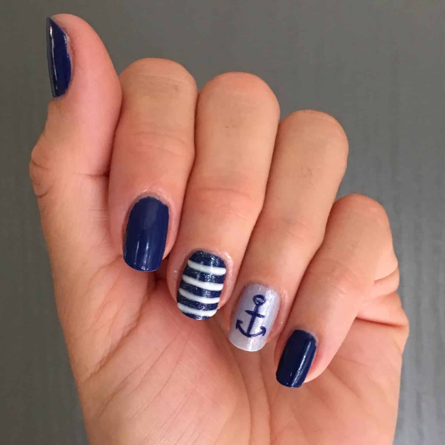 3. Classic Navy with Stripes and Anchor - anchor nail ideas
