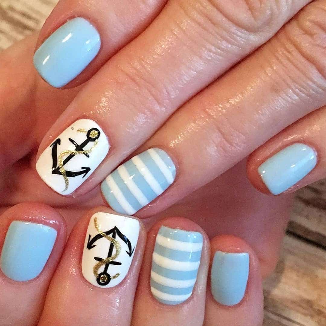 9. Pastel Blue Anchors and Stripes - anchor nail ideas