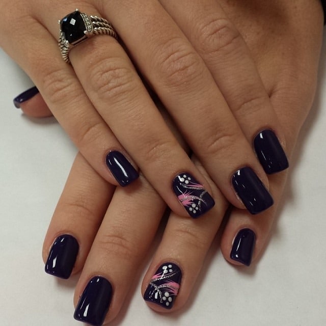 11. Midnight Navy with Floral Accent - anchor nail ideas