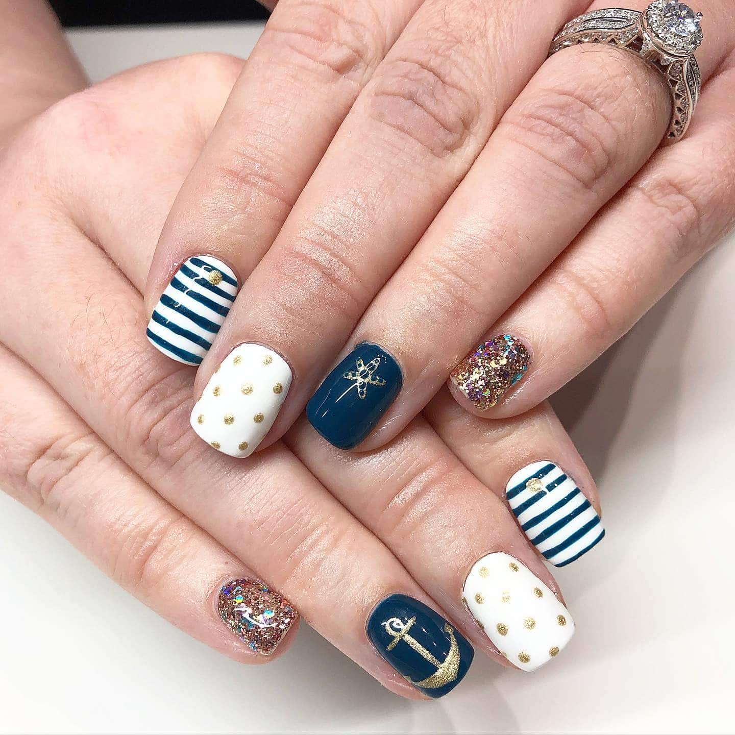 22. Nautical Chic with Gold Accents - anchor nail ideas