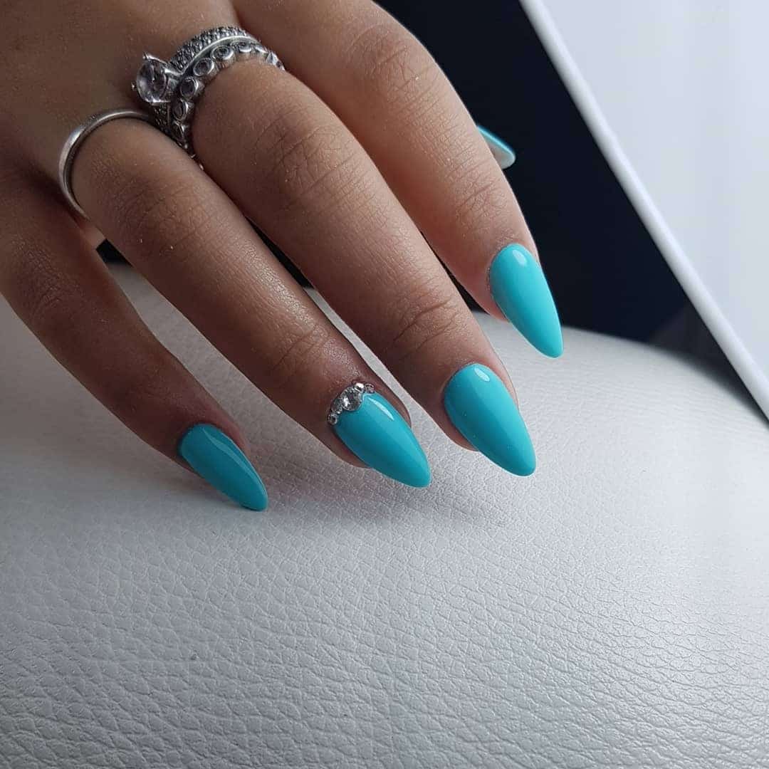 1. Sleek Aqua Almond Nails - aqua color nail ideas