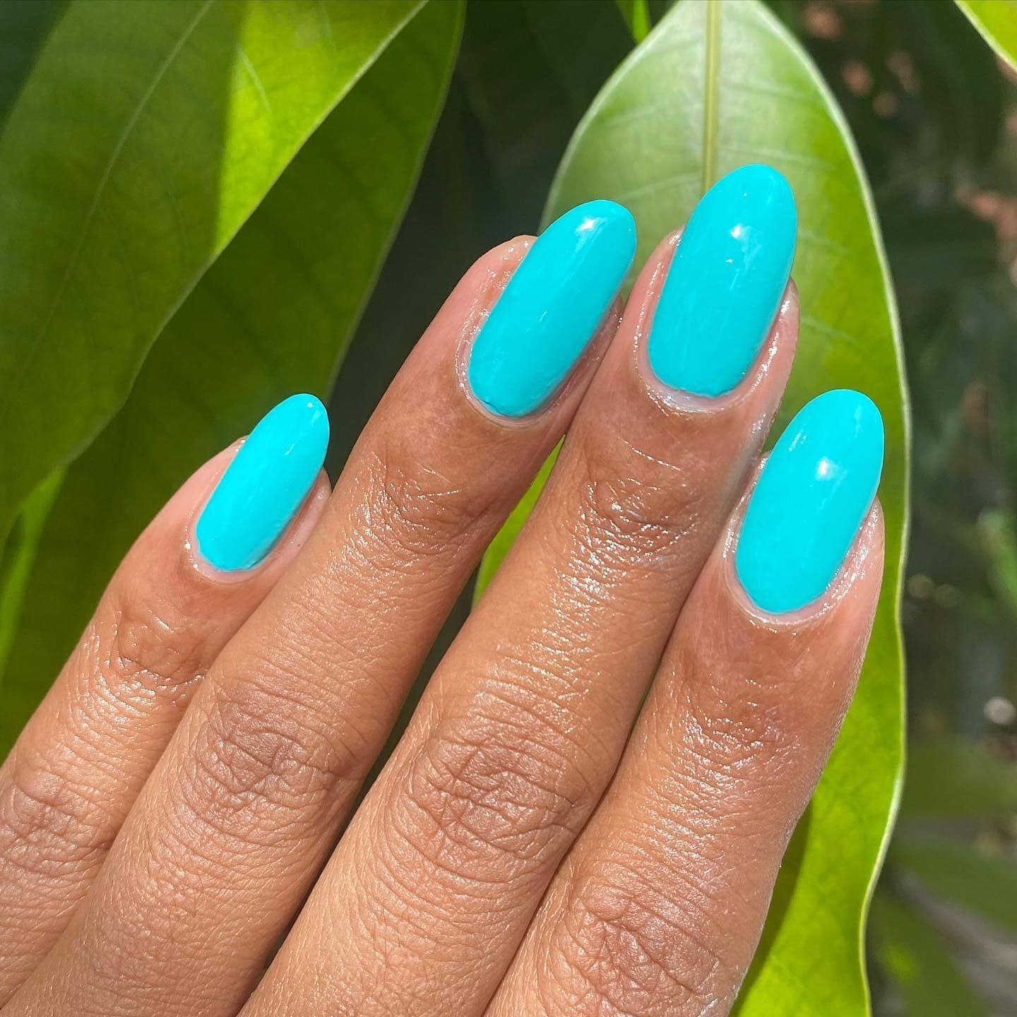 8. Natural Aqua Shine - aqua color nail ideas