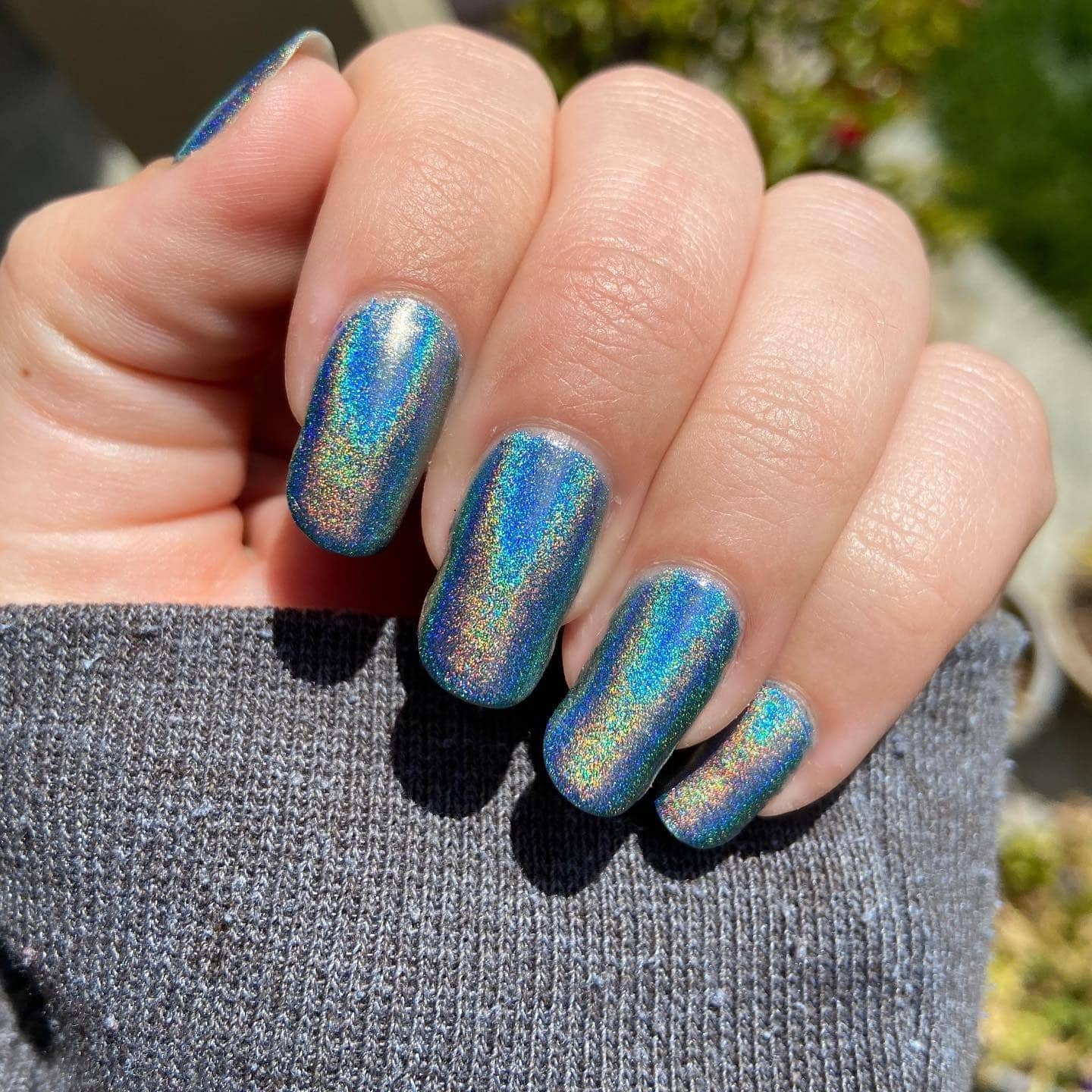 10. Aqua Holographic Glow - aqua color nail ideas
