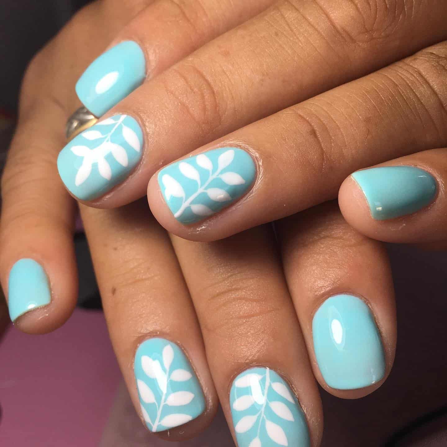 15. Aqua Leaves - aqua color nail ideas