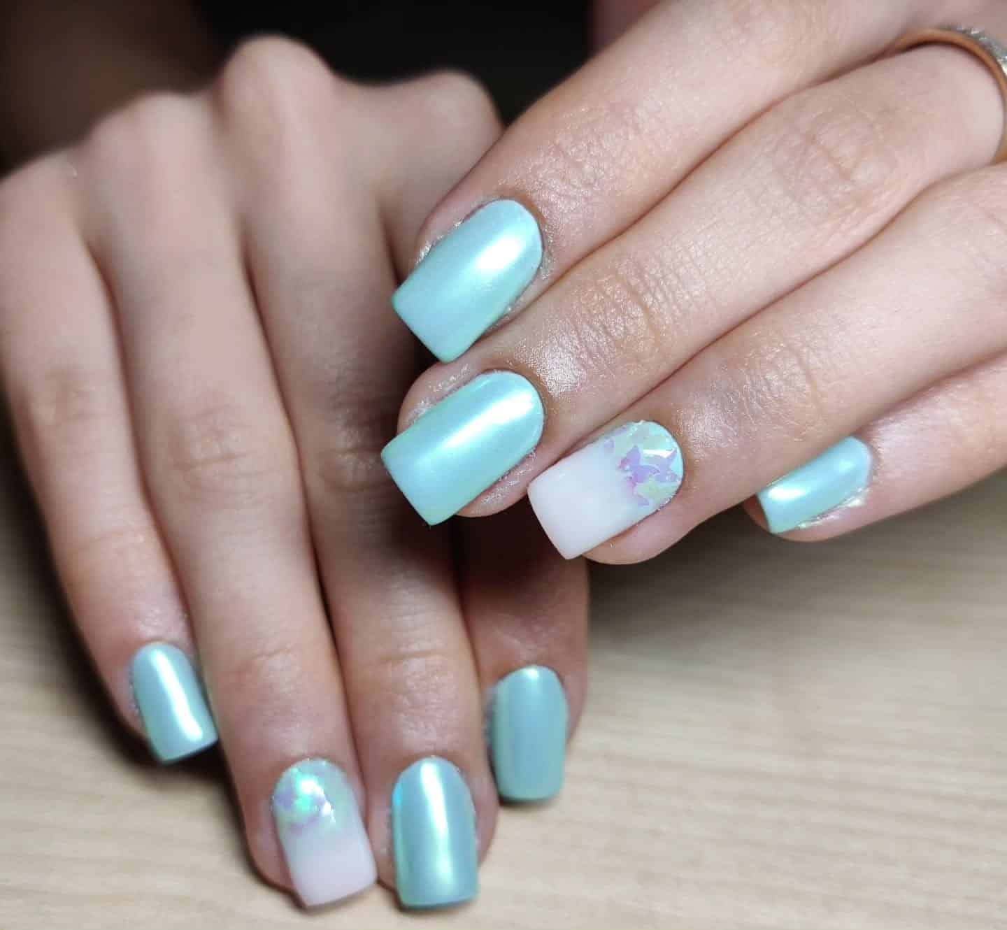 17. Shimmer Aqua Glow - aqua color nail ideas