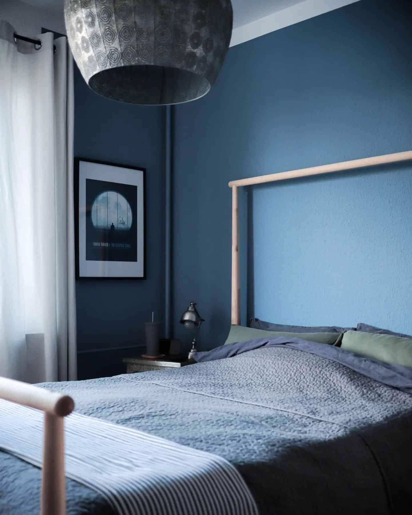 2. Moody Blue Minimalism - blue and gray bedroom ideas