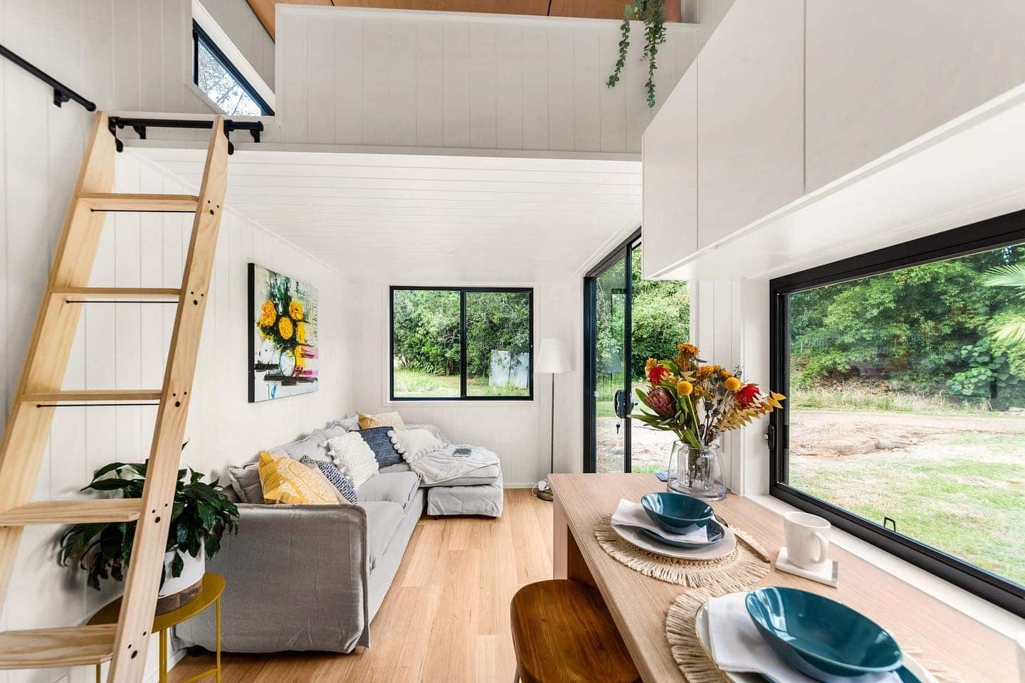 2. Light and Breezy Lounge with Soft Neutrals - tiny house living room ideas