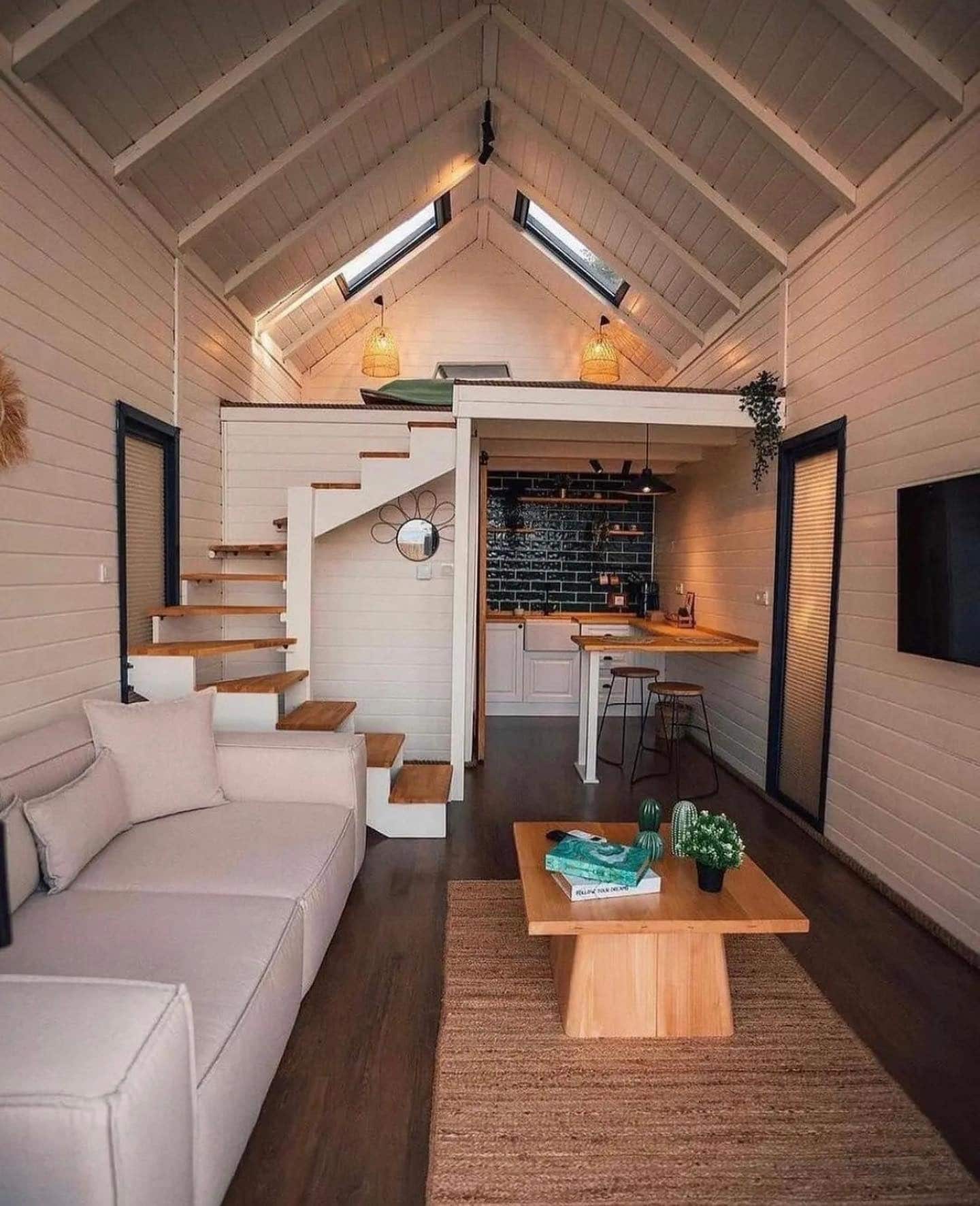 6. Vaulted Cottage Style with Black Accents - tiny house living room ideas